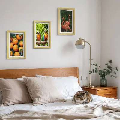 Photo frame wall with tropical fruity accents featuring parrots and flamingos