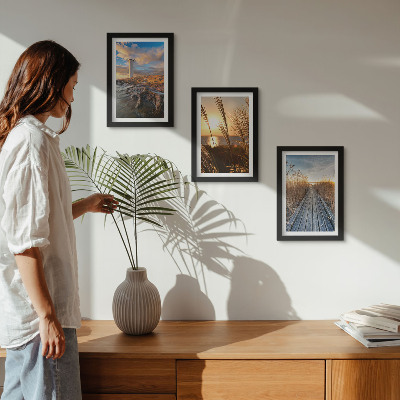 3-piece wall art set View of the lighthouse by the sea, grass and a wooden pier