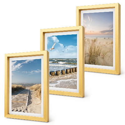 Photo frame wall Beach with sand, waves, sky and birds in flight