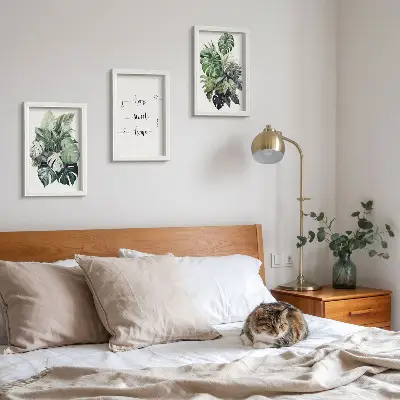 3-piece wall art set featuring watercolor monstera leaves and home sweet home text