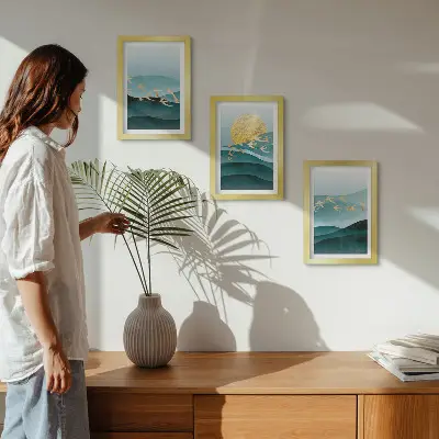 Photo frame wall with abstract landscapes of sun waves and flying birds