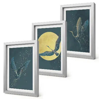 3-piece wall art set featuring crane birds in flight against the backdrop of the moon and stars
