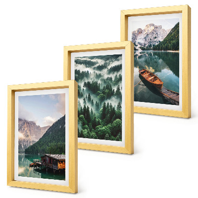 Photo frame wall Mountain landscapes with a lake, a boat, and a forest in the fog