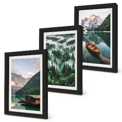 Photo frame wall Mountain landscapes with a lake, a boat, and a forest in the fog
