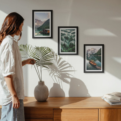 Photo frame wall Mountain landscapes with a lake, a boat, and a forest in the fog
