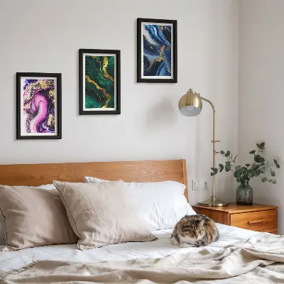 Photo frame wall with abstract patterns in shades of pink, green, and blue