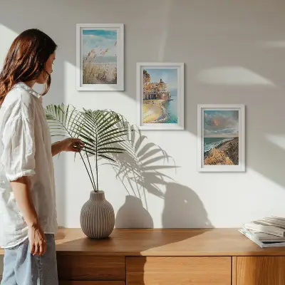 3-piece wall art set seaside landscapes featuring a beach, city, and cliffs