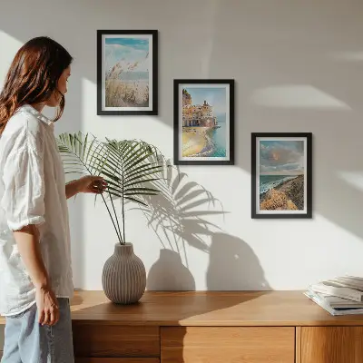 3-piece wall art set seaside landscapes featuring a beach, city, and cliffs