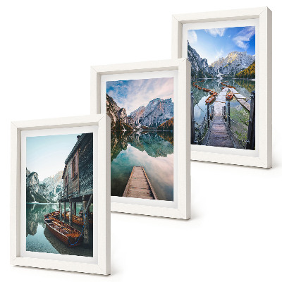 Framed triptych A quiet lake in the mountains with wooden boats