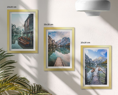 Framed triptych A quiet lake in the mountains with wooden boats