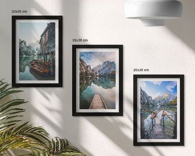 Framed triptych A quiet lake in the mountains with wooden boats