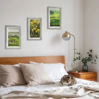 Photo frame wall with Italian landscapes featuring citrus trees and green hills