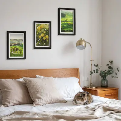 Photo frame wall with Italian landscapes featuring citrus trees and green hills
