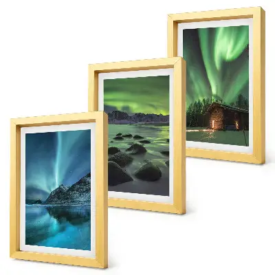 Winter landscapes with the Northern Lights over the mountains framed triptych