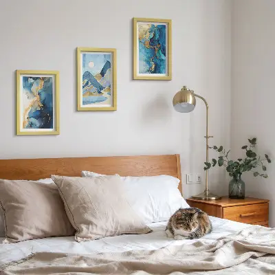 Photo frame wall with blue mountains and abstract pattern elements
