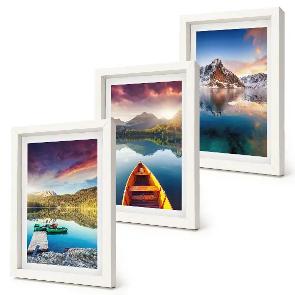 Tranquil lakes with mountain scenery and a boat framed triptych
