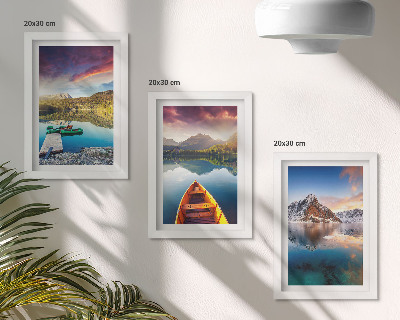 Framed triptych Tranquil lakes with mountain scenery and a boat
