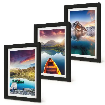 Tranquil lakes with mountain scenery and a boat framed triptych