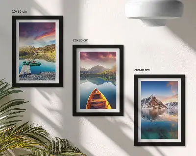 Tranquil lakes with mountain scenery and a boat framed triptych