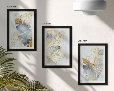 3-Piece wall art set featuring leaves in shades of blue and beige on a light background