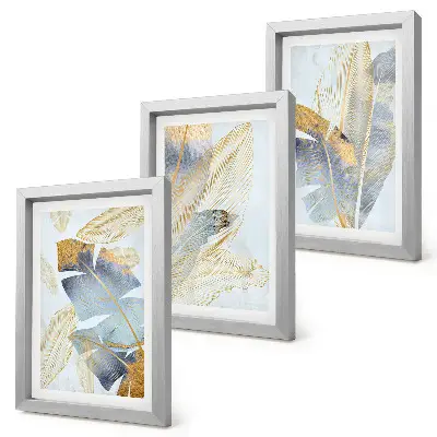 3-Piece wall art set featuring leaves in shades of blue and beige on a light background