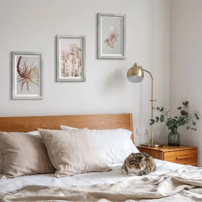 Photo frame wall featuring flowers and grasses on a light background in a harmonious set