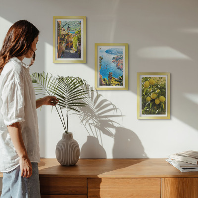 Photo frame wall Picturesque seaside streets with a view of the sea and lemons