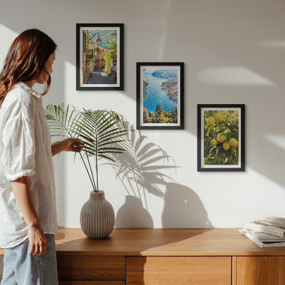 Photo frame wall Picturesque seaside streets with a view of the sea and lemons