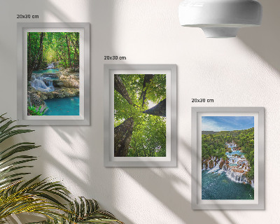 Photo frame wall Waterfalls in a green forest with crystal clear water