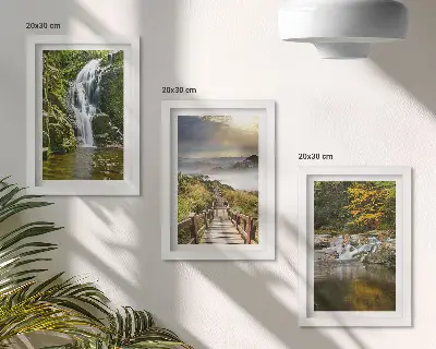 Framed triptych wall art featuring waterfalls, mountains, cloud paths, and autumn views