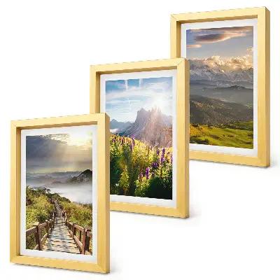 Photo frame wall gallery mountain landscapes featuring flowers, a clear sky, and a path