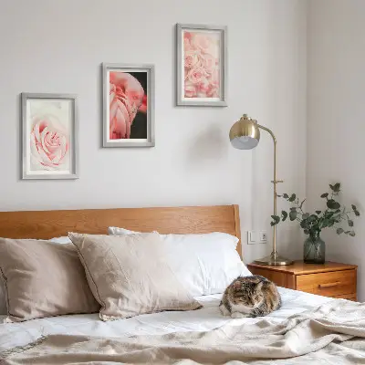 Photo frame wall in delicate pastel pink and flamingo shades