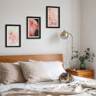 Photo frame wall in delicate pastel pink and flamingo shades