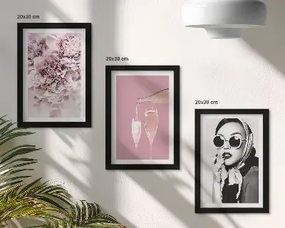 3-piece wall art set featuring flowers in shades of pink and an elegant woman
