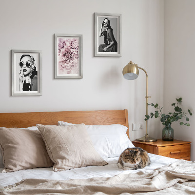 Photo frame wall Stylish portraits of women with pink flowers