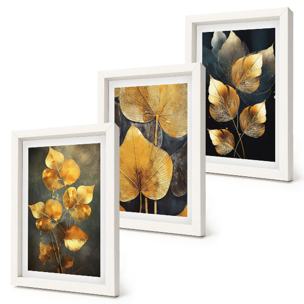 Framed triptych Leaves in shades of yellow on a dark background