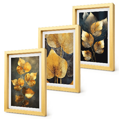 Framed triptych Leaves in shades of yellow on a dark background