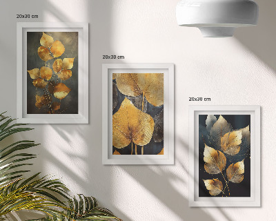 Framed triptych Leaves in shades of yellow on a dark background
