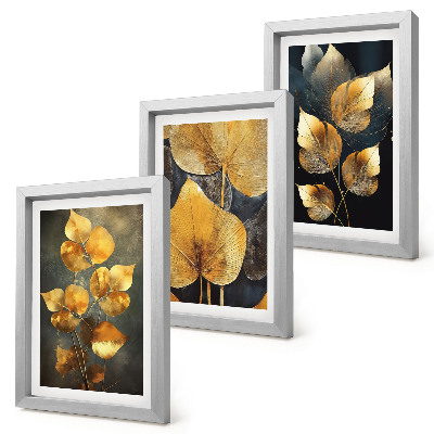 Framed triptych Leaves in shades of yellow on a dark background