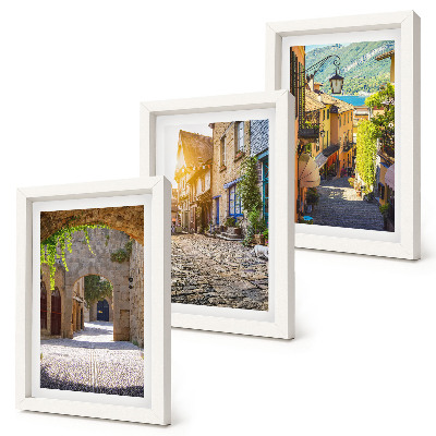 Framed triptych Charming streets with stone buildings and gates