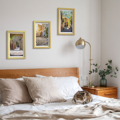 Framed triptych Charming streets with stone buildings and gates
