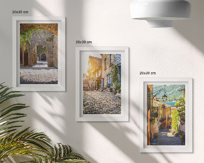 Framed triptych Charming streets with stone buildings and gates