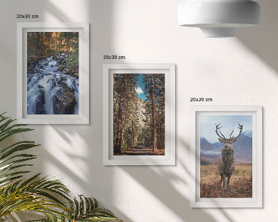 Framed triptych Waterfall in the forest, mountains and deer in nature