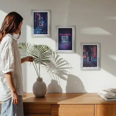 Photo frame wall Night city with neon lights and a cinema entrance