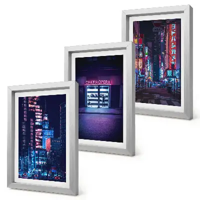 Photo frame wall Night city with neon lights and a cinema entrance