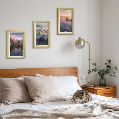 Mountain landscape framed triptych with water and rocks in the background