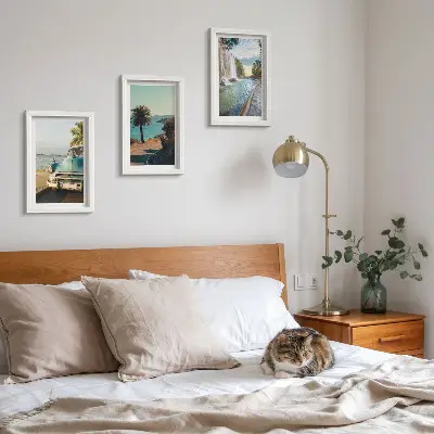 Holiday landscapes with palm trees and a waterfall framed triptych