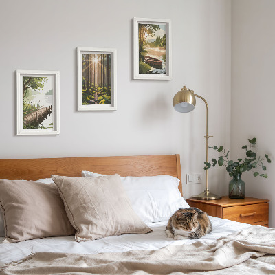 Photo frame wall Peaceful landscapes of the forest and lake with a boat