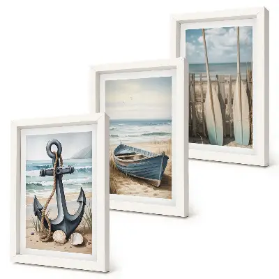 Framed triptych boat anchor and oars on a beach with the sea