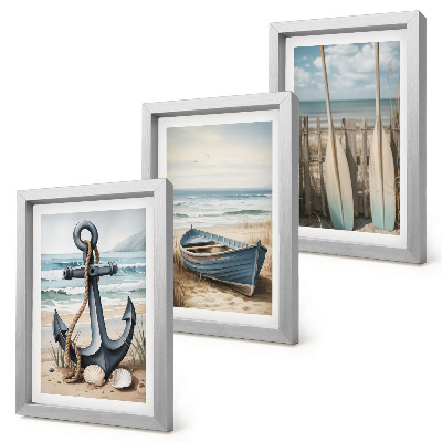 Framed triptych Boat anchor and oars on the beach with the sea